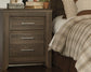 Juararo Queen Panel Headboard with Mirrored Dresser, Chest and Nightstand